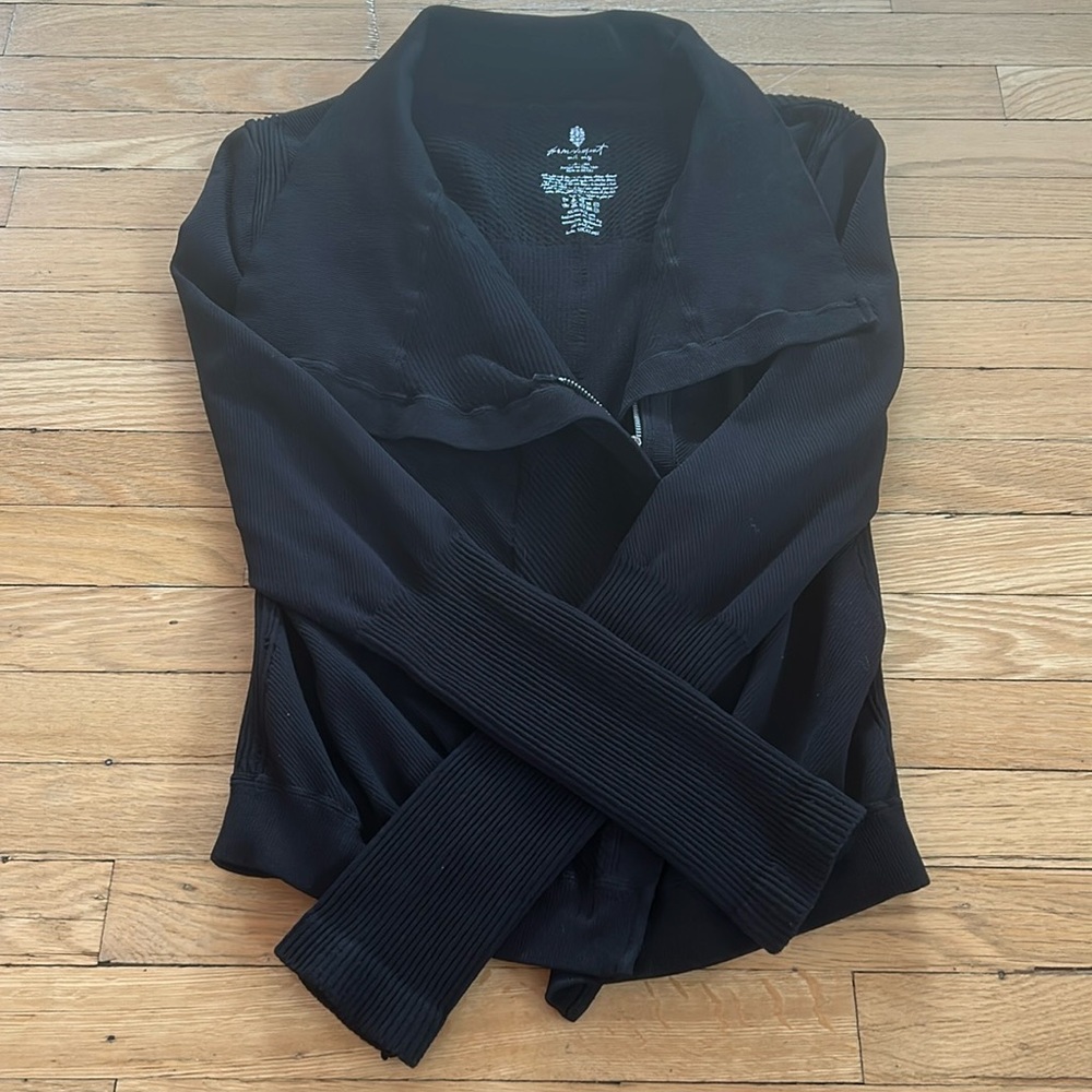 Free people movement long sleeve zip up jacket.